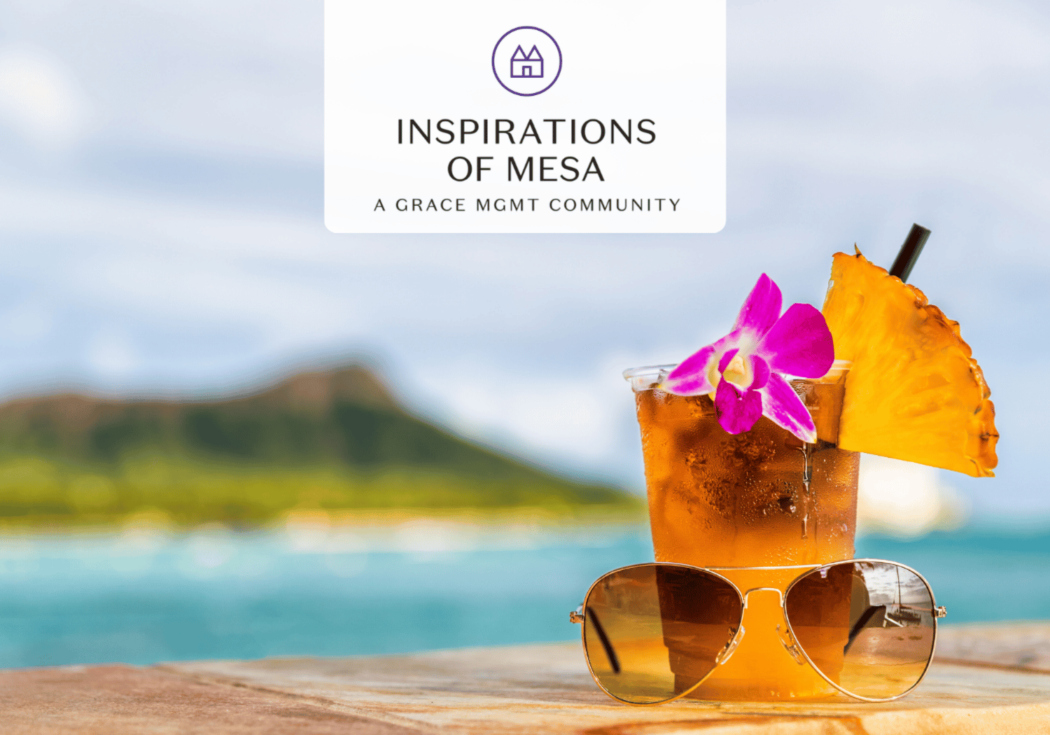 Tropical pineapple cocktail with orchid garnish and pineapple slice on a wooden table beside the ocean, sunglasses in the foreground, logo at the top.